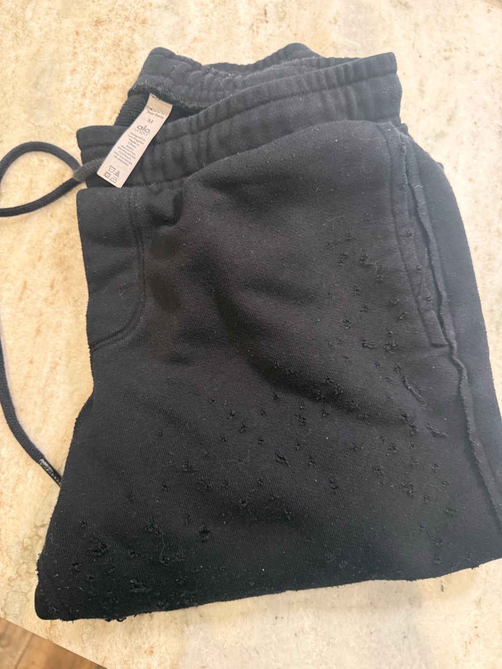 ALO Yoga Black Destroyed Joggers with Subtle Texture Size M